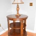 F12. Round mahogany tiered side table. 28"h x 27" 